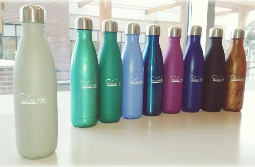 Nolan Hill Dental water bottles in a range of colours