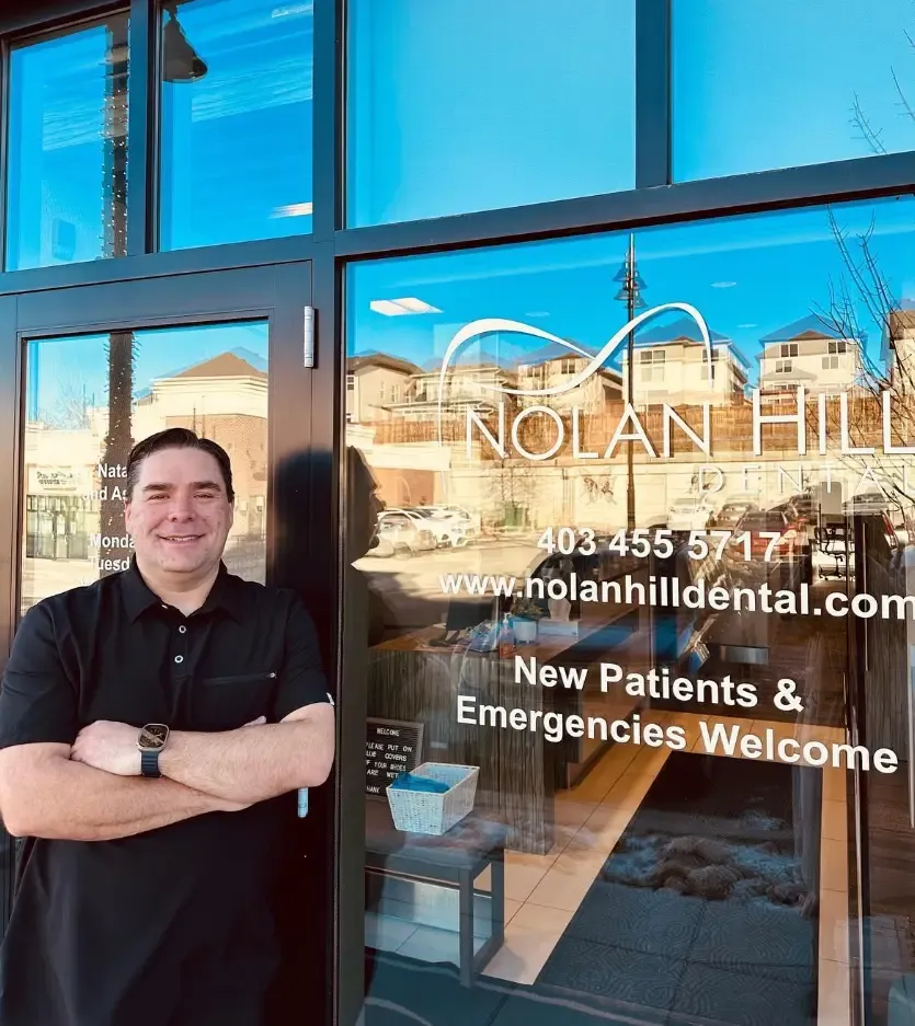 Dr. Michael Lettich standing at the clinic entrance